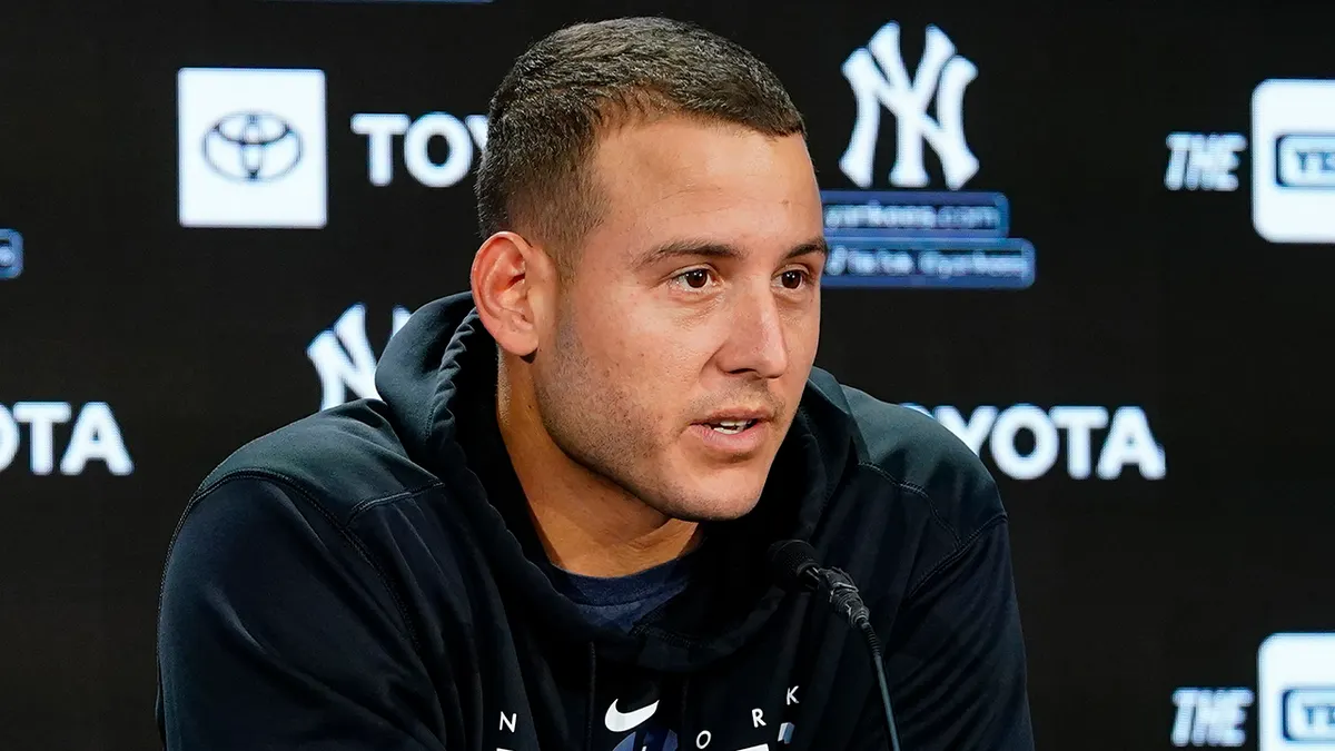 New York Yankees' Anthony Rizzo answering questions during a news interview.