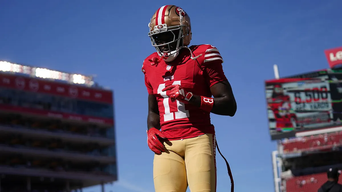 San Francisco 49ers wide receiver Brandon Aiyuk walking on the field at Levi's Stadium.