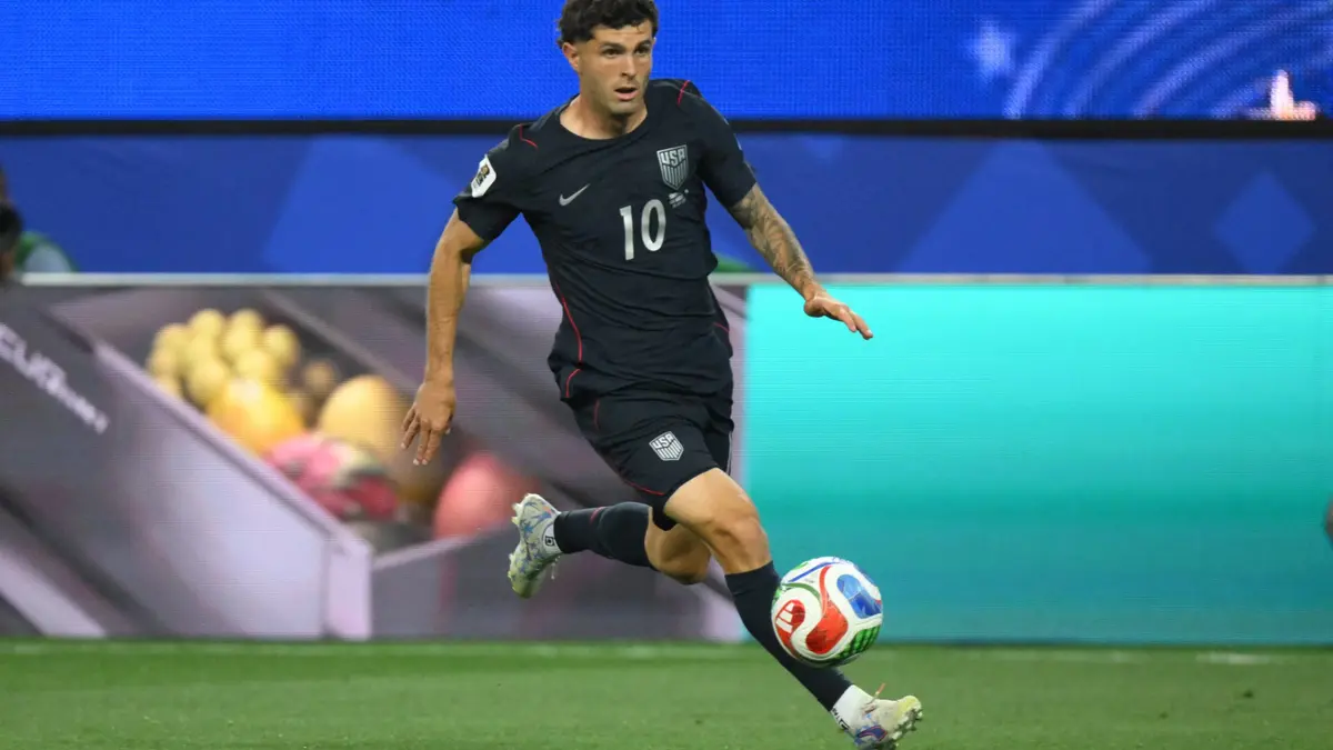 Christian Pulisic took the field in the 58th minute of the USA's loss to Türkiye after suffering a calf injury in the team's World Cup opener against Paraguay. (Photo by Patrick T. FALLON / AFP via Getty Images)