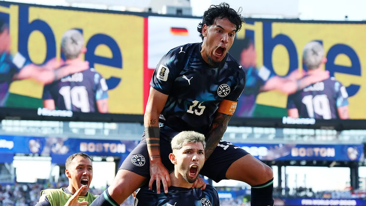 Julio Enciso celebrating with Gustavo Gomez after scoring a goal at Boston Stadium.
