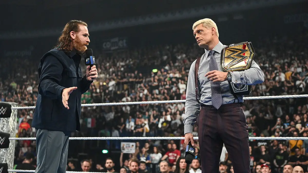 Sami Zayn and Undisputed WWE Champion Cody Rhodes speaking during SmackDown at Unipol Arena in Bologna